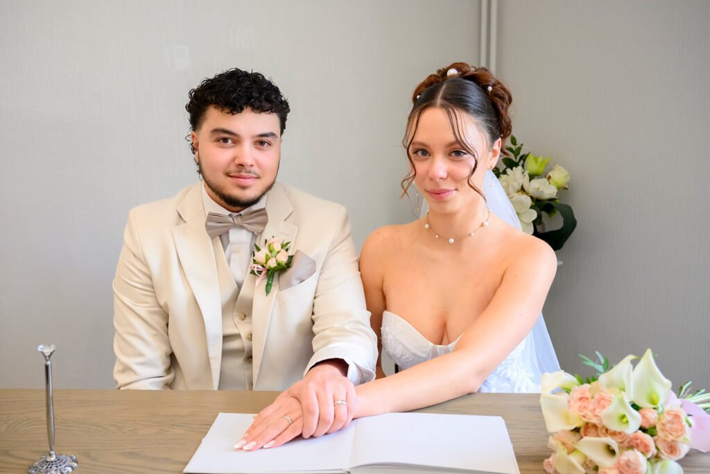 Close up of bride and groom holding hands during Sandwell wedding.