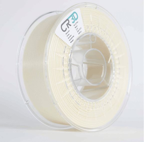 Seitliche Ansicht einer Spule mit weißem Filament, in einer transparenten Kunststoffverpackung.