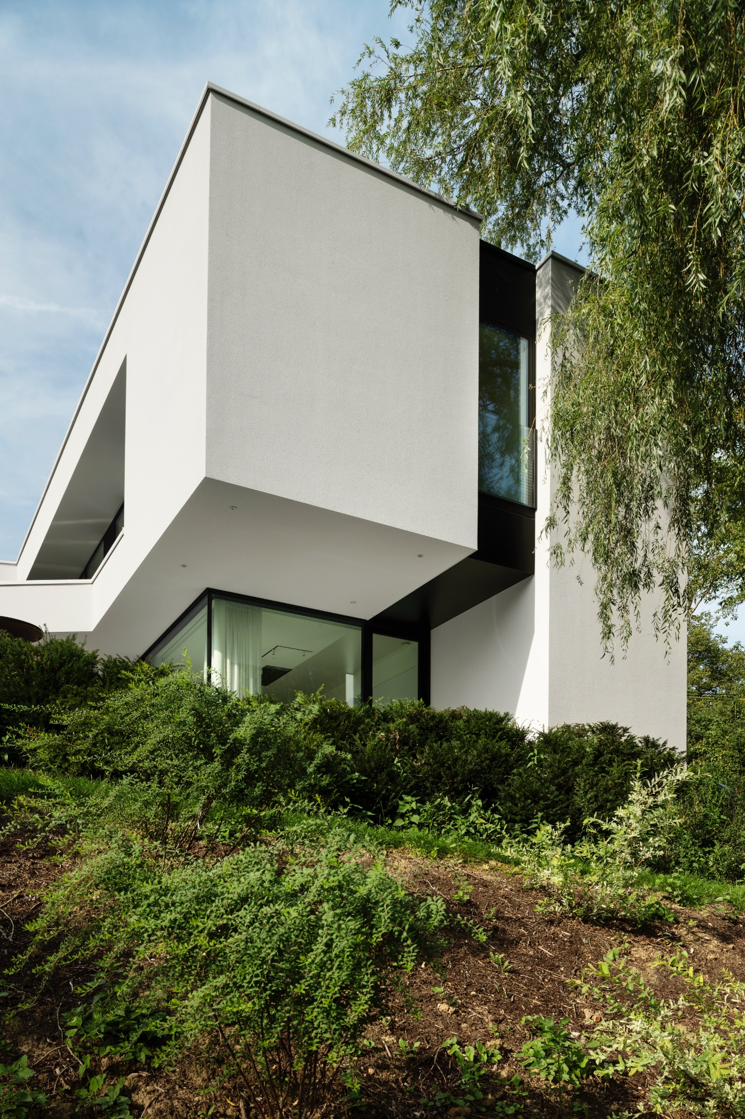 Façade arrière d'une maison contemporaine à Lasne