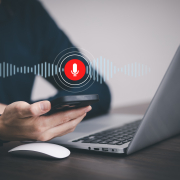 Businessman using laptop and touch microphone button on virtual screen. Blog blog speak talk advertising presentation,Voice recognition, speech detection and deep learning application,Voice Assistance Microphone button on virtual screen