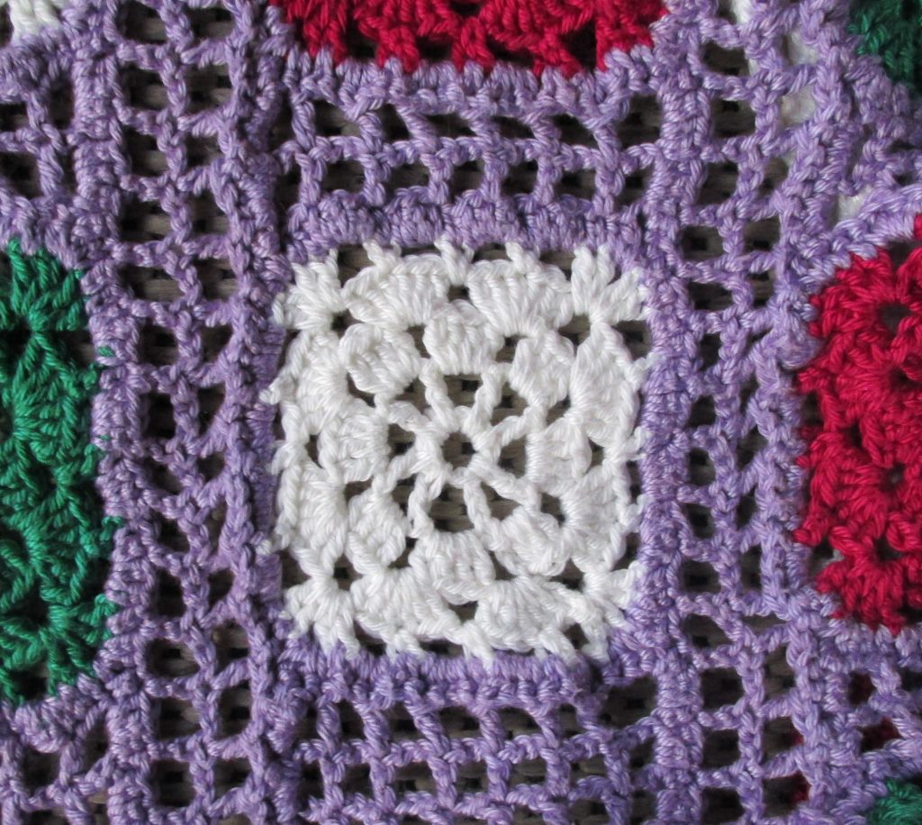 Crocheted squares are often called «granny squares».