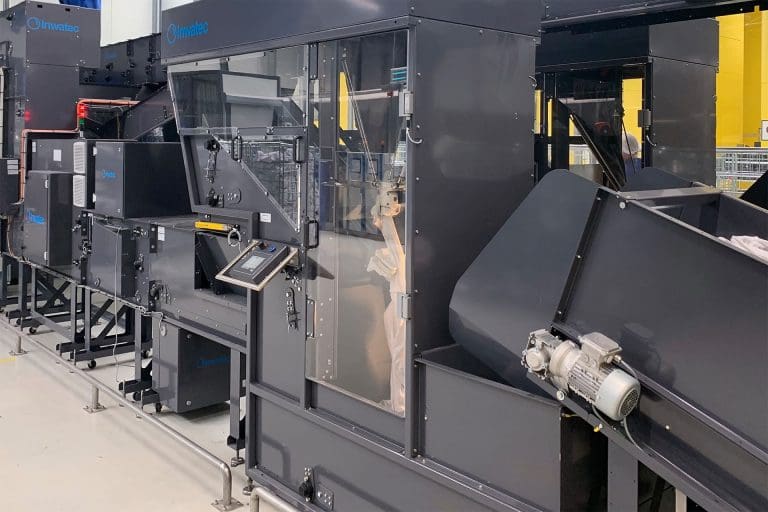 Inwatec machine in dark gray for soiled side sorting.