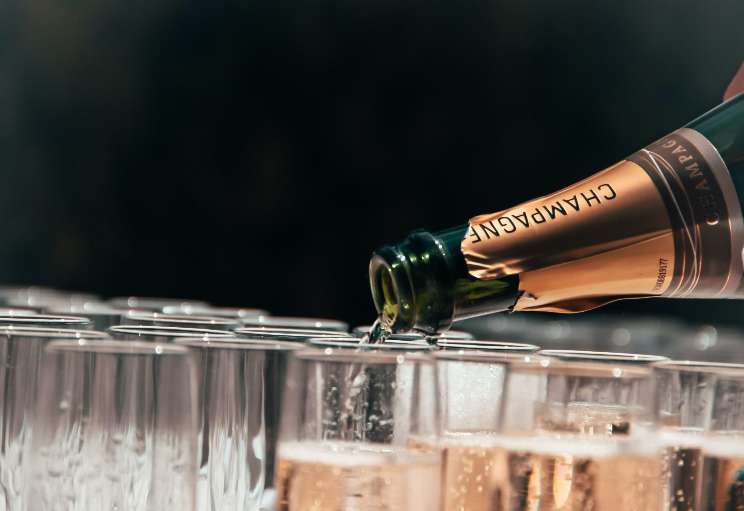 Serving champagne in corporate events