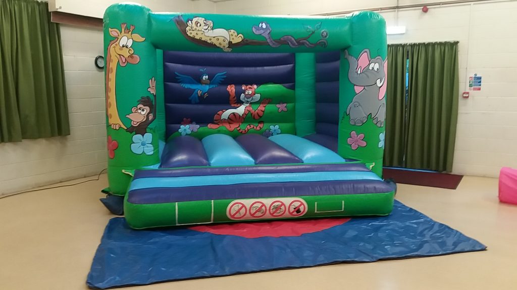 Jungle bouncy castle hire for children birthday party christening