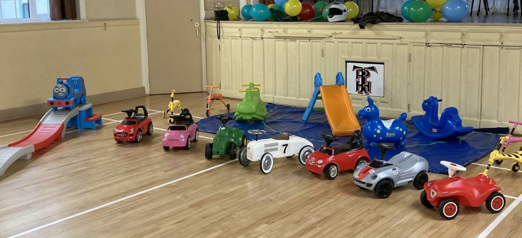 Selection of Ride On Toys for Toddler Party in Twyford Village Hall