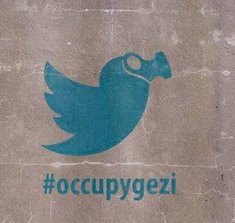 Twitter logo bird wearing a gas mask. #occupygezi hashtag. Digital artwork mimicking street graffiti widely circulated on social media. Source: Twitter