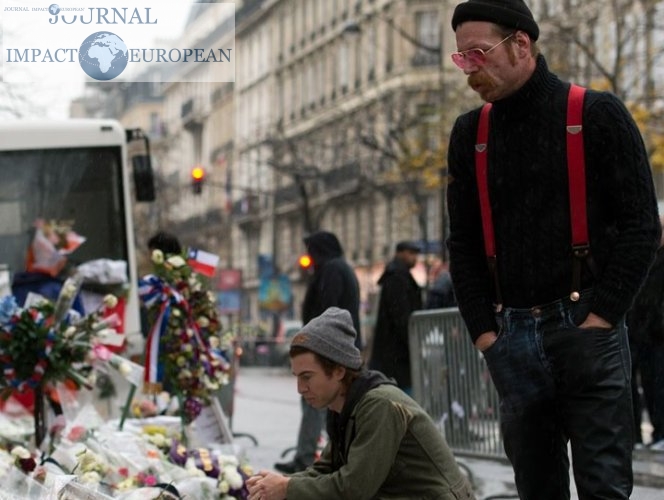 Hommages:Les membres du groupe Eagles of Death Metal, se recueillir mardi devant le Bataclan