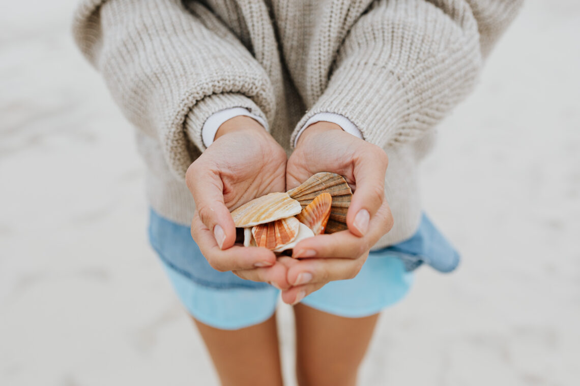 woman with seashells in her hands