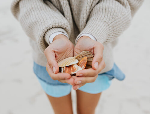 woman with seashells in her hands