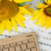wooden keyboard with sunflowers