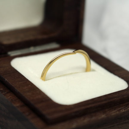 Recycled yellow gold wedding ring shaped to fit engagement ring Ethical gold wishbone wedding ring by Julie Nicaisse - Jewellery Designer in London