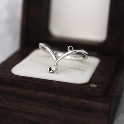 Fairtrade white gold and black diamond wishbone ring by Julie Nicaisse - Jewellery Designer in London