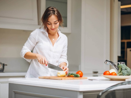 Women cooking in the kitchen.