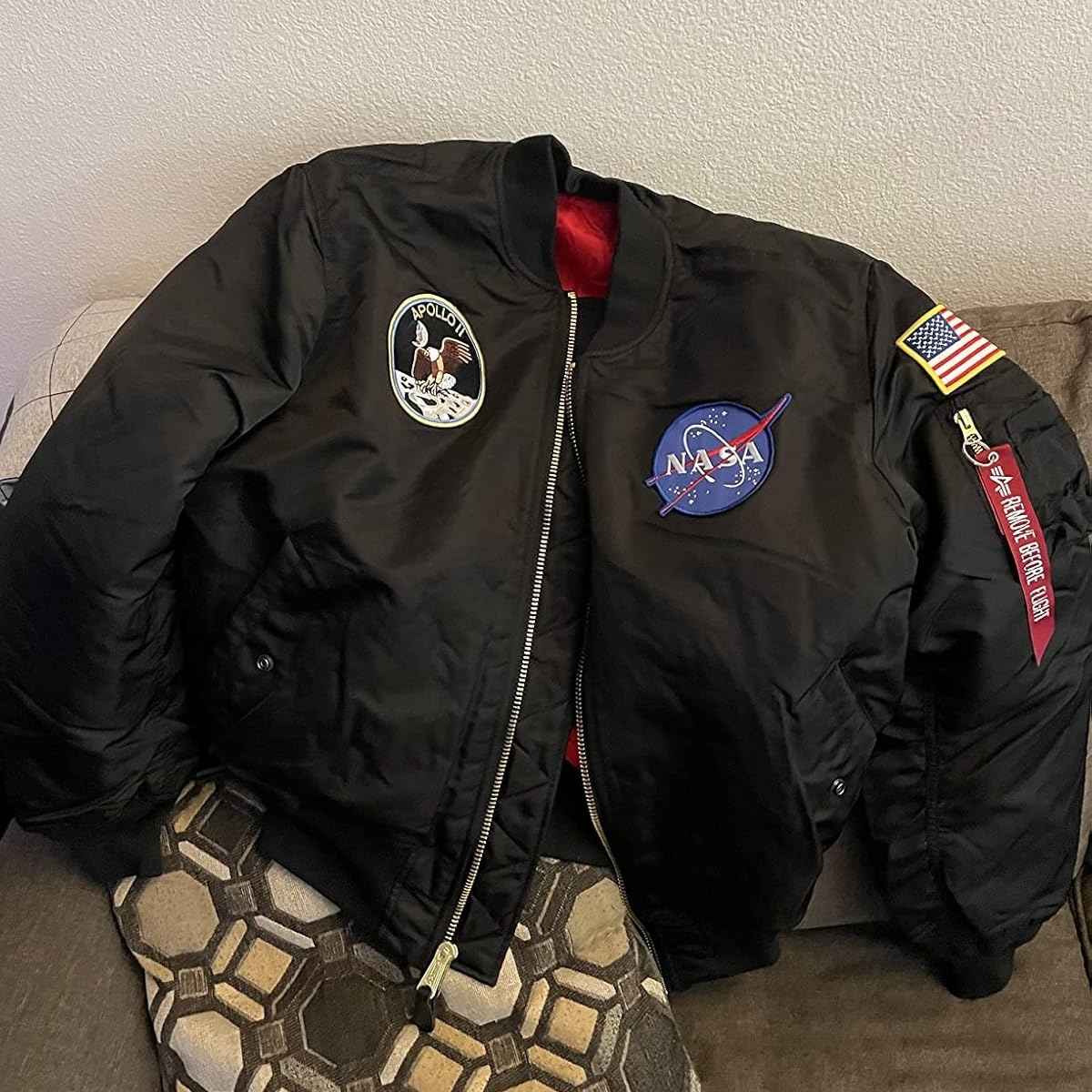 a black jacket with patches on it