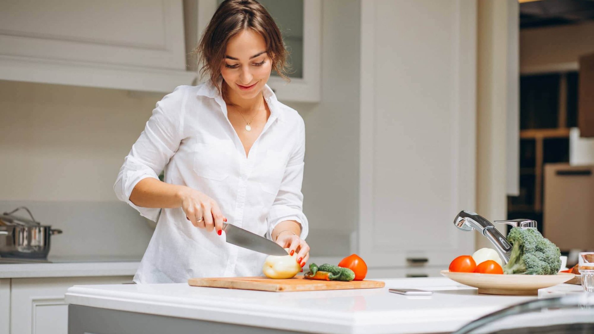 Women cooking in the kitchen.