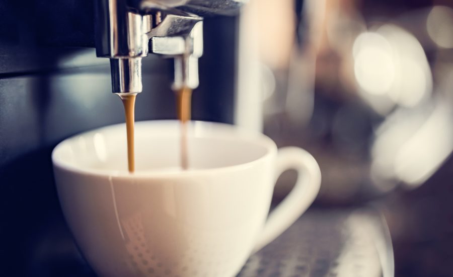 Espresso machine making fresh cup of coffee