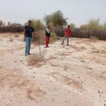 Kal-Adiama volunteer planting trees