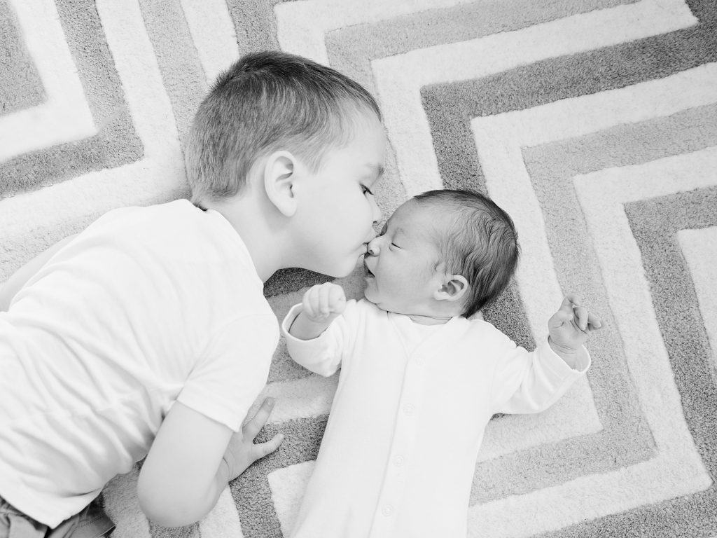 at home lifestyle photography edinburgh toddler brother and new baby sister