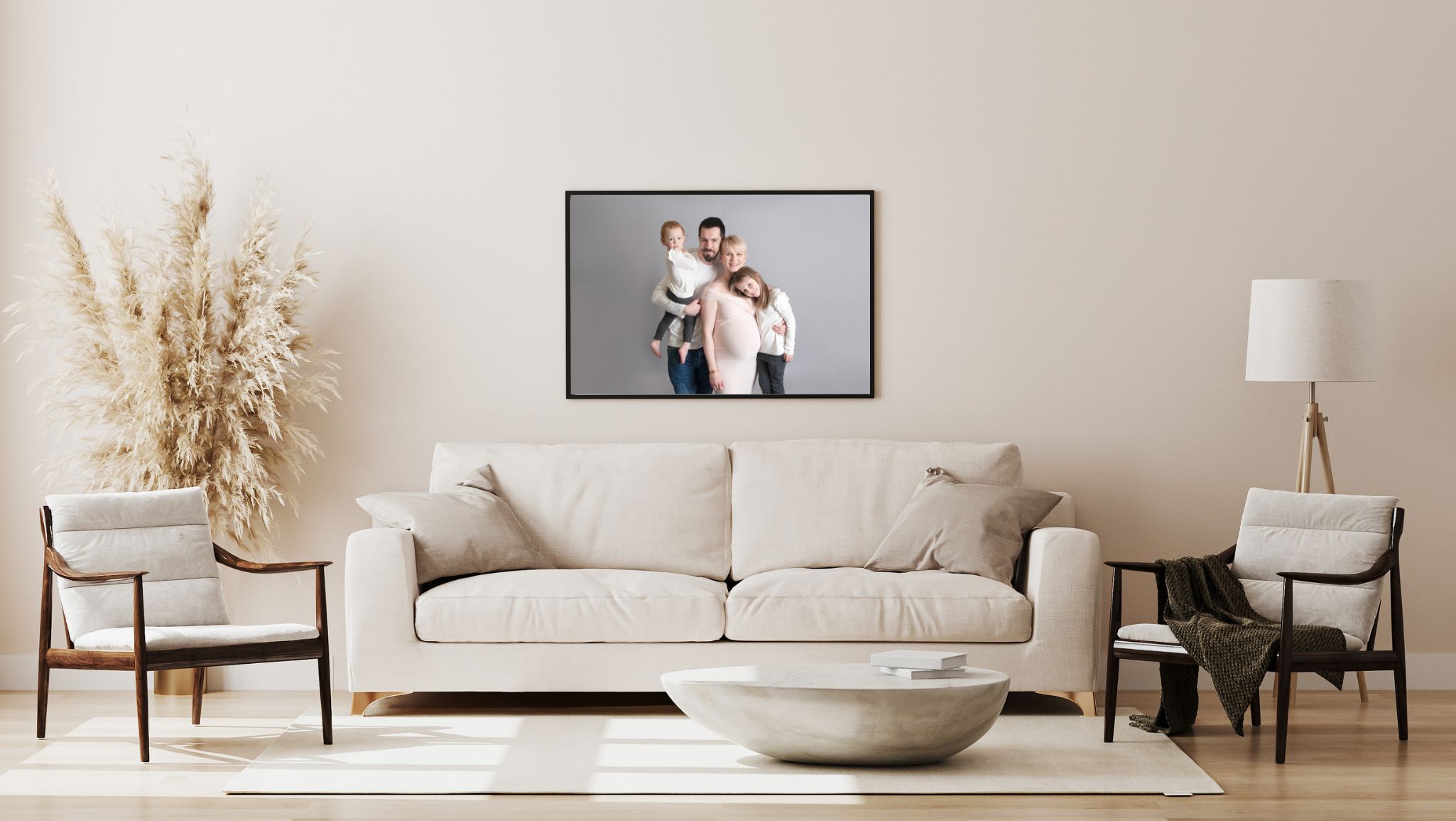 framed family portrait displayed in the living room