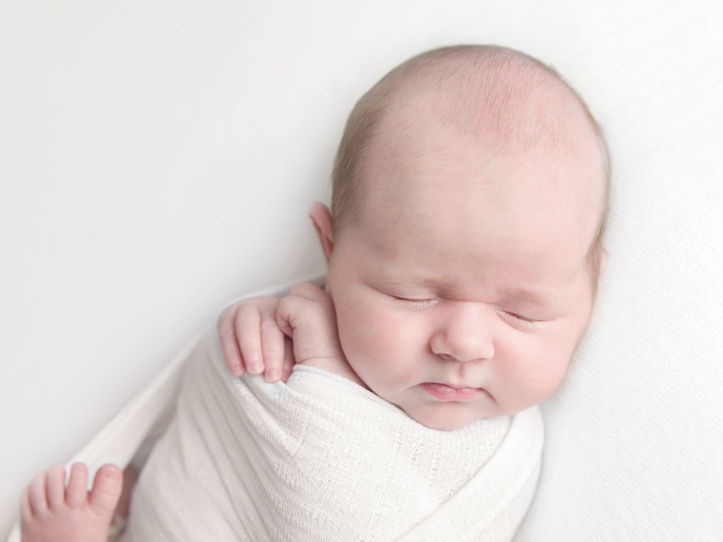 newborn baby posed in a wrap, newborn photographer edinburgh