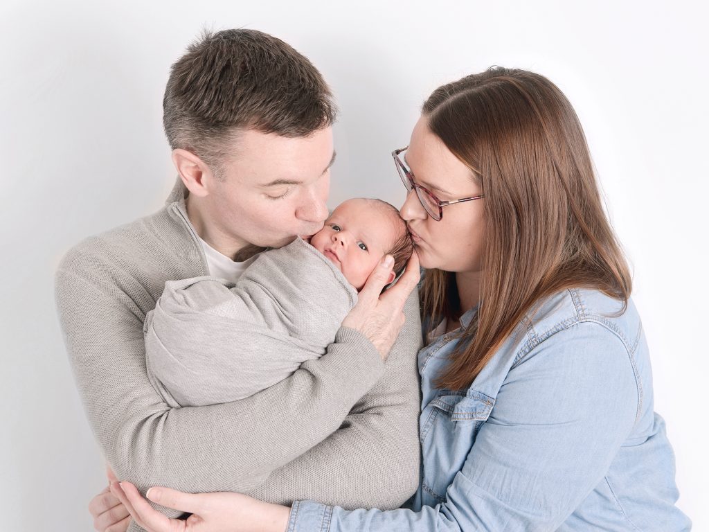 mum and dad with a newborn posing ideas newborn photography edinburgh