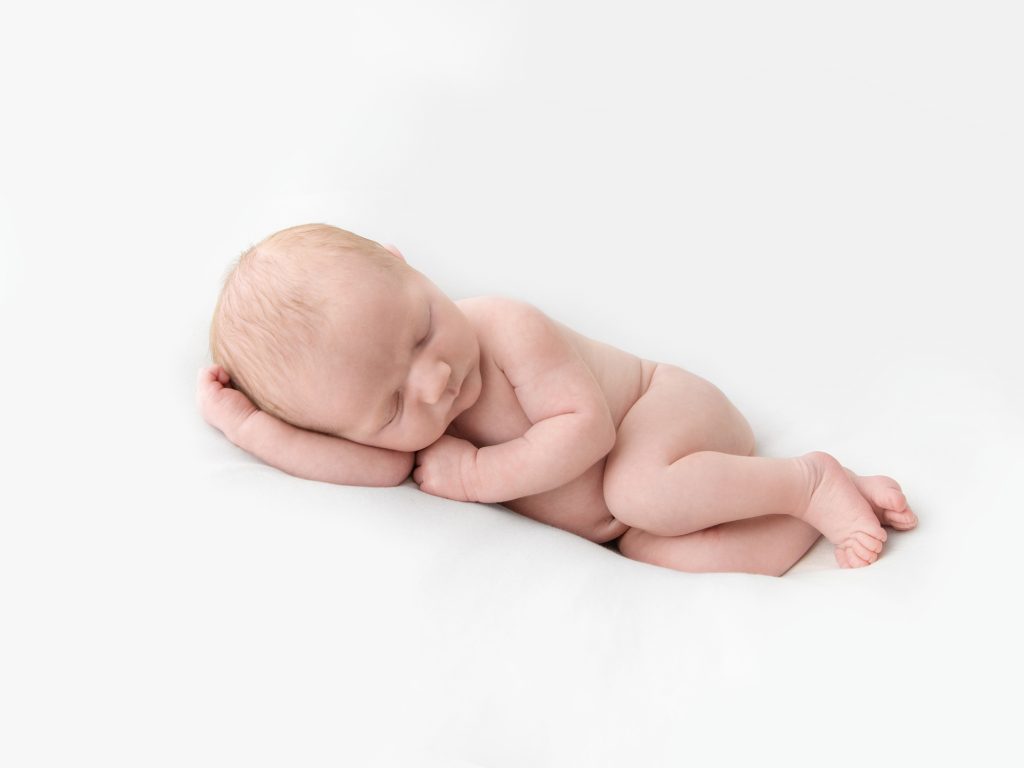 side pose all white baby photography newborn photoshoot edinburgh