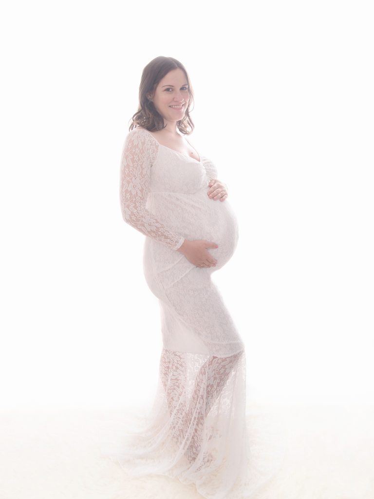 white long sleeve dress backlit maternity photoshoot edinburgh
