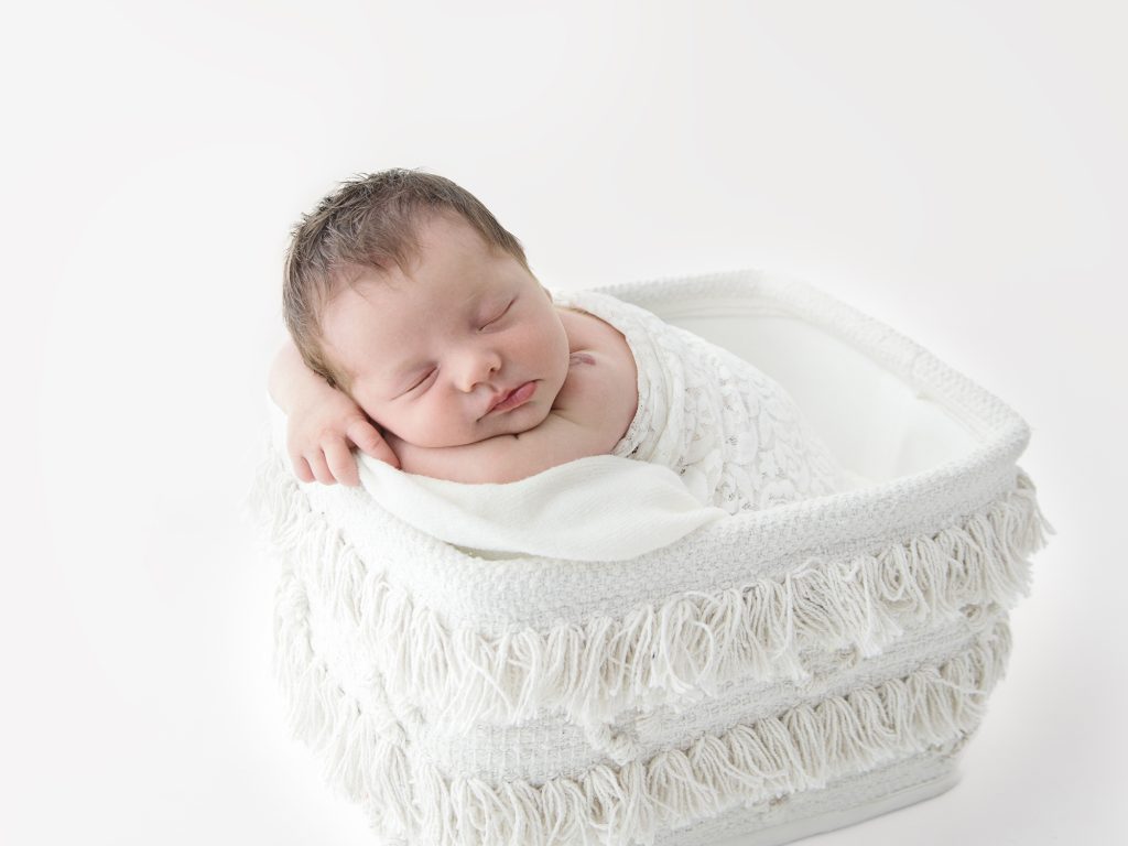 simple subtle prop posing newborn photos