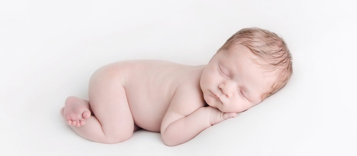 naked newborn on white background newborn photographer edinburgh