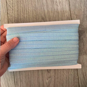 Folde elastik glimmer lys blå