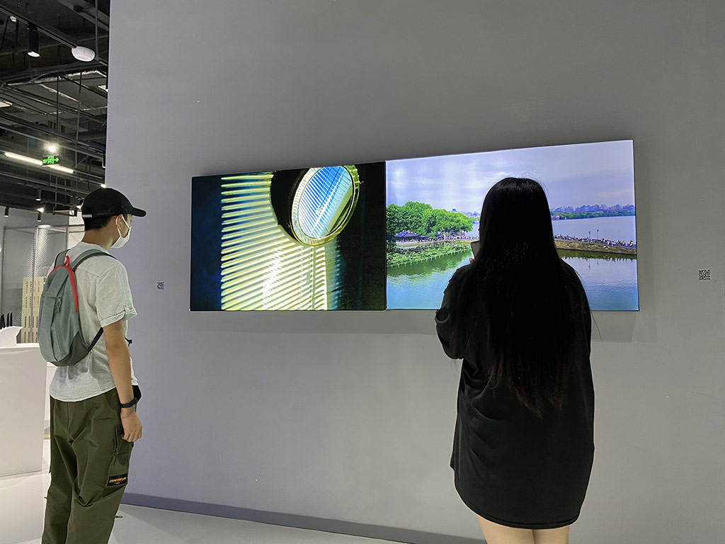 Visitors viewing Sun-Penetrations and Empathetic Walking Panel light-box installations, Shanghai, 2021
