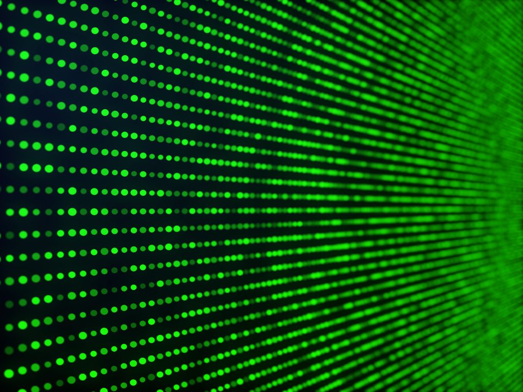 Panel de comunicaciones de datos representados con cientos de puntos verdes brillantes sobre fondo negro. Kiribil Semilla