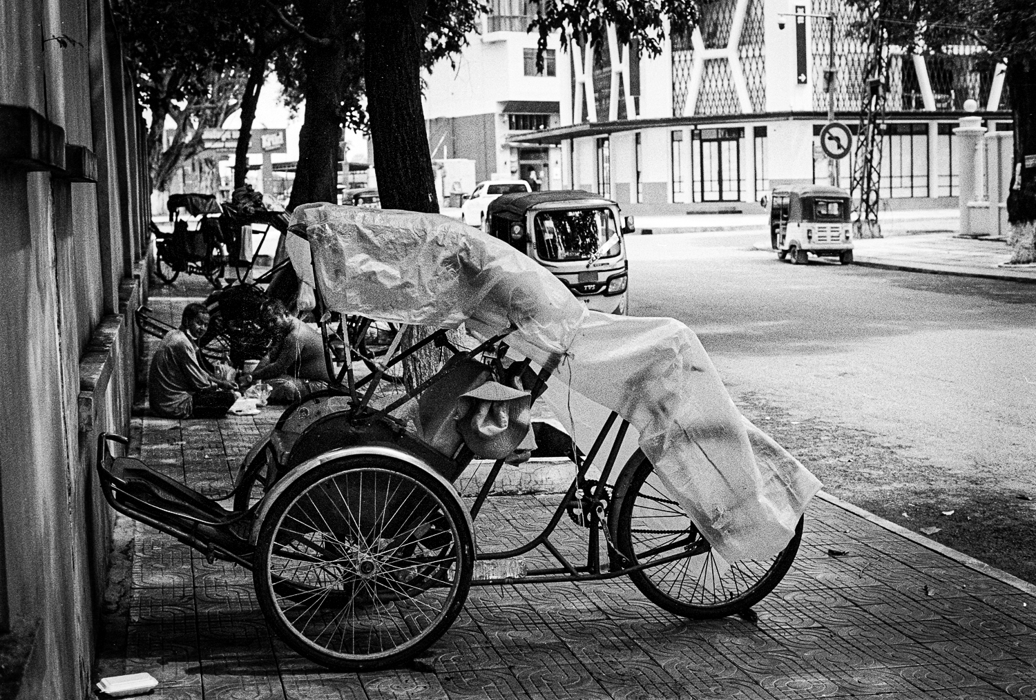 Cyclo drivers take a break in Phnom Penh 2023