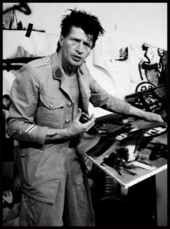 Herman Brood painting in his studio photograph by Michael Klinkhamer 1991