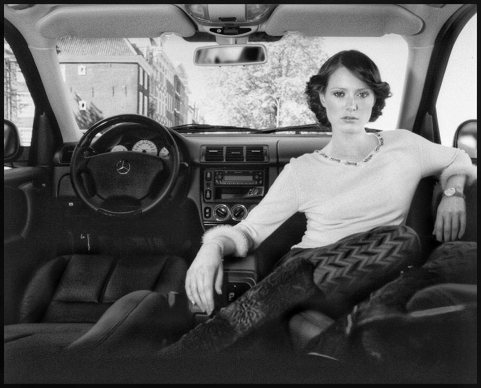 beautiful woman photography inside a car retro