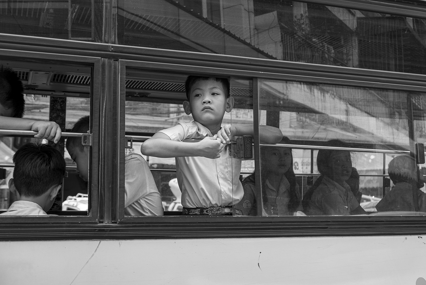 Boy on the bus in Phnom Penh