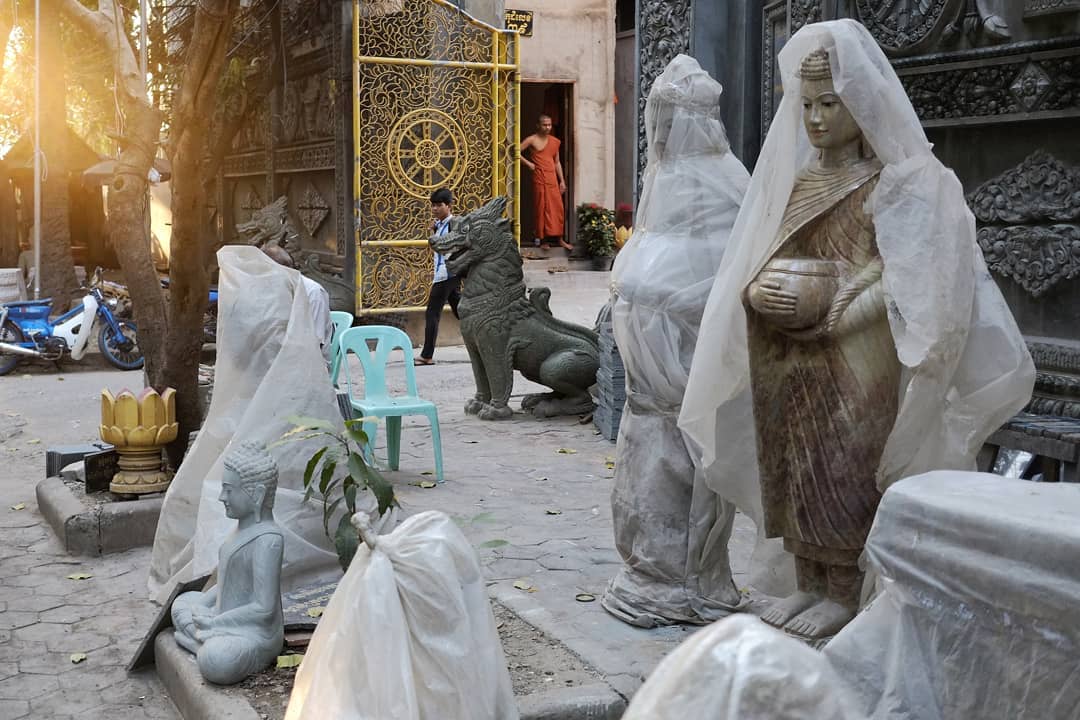 Phnom Penh street Buddha sunset