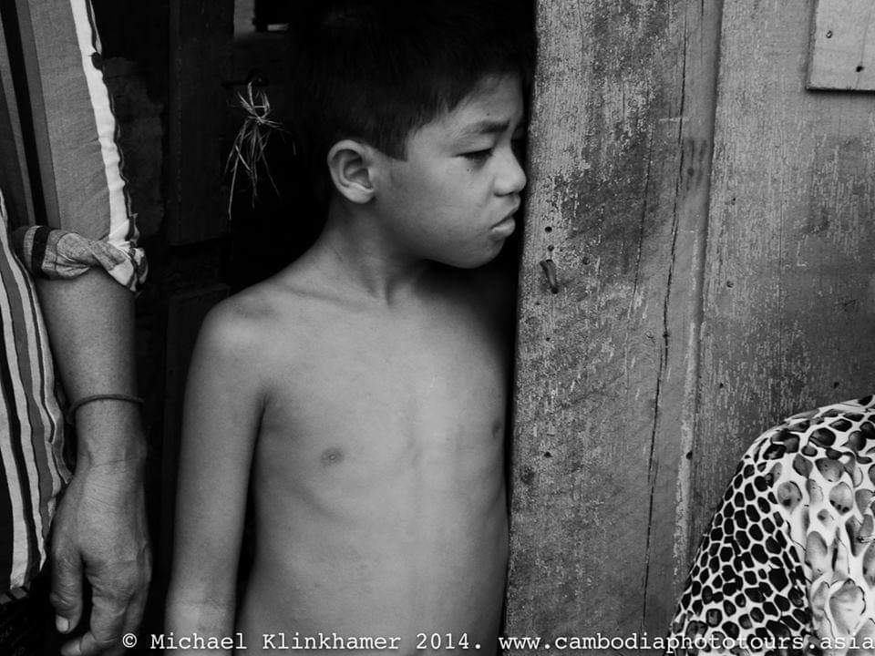 Boy in Cambodia living in darkness_klinkhamerphoto