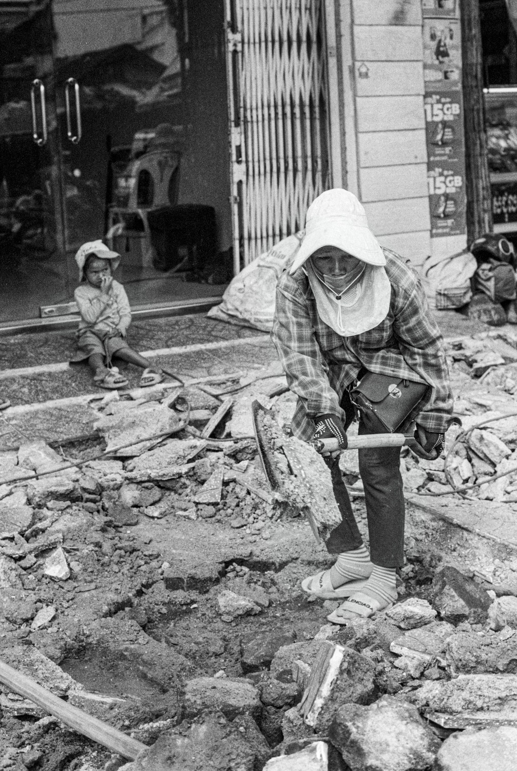 Woman road worker in Phnom Penh