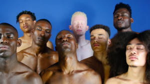 a group of eight black men of different shades