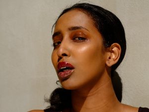 closeup beauty photo of model in glossy makeup