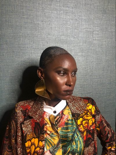 color photo backstage at designer Christie Brown's runway show at Glitz Fashion Week, Accra, Ghana