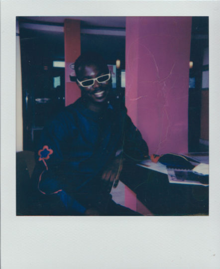 krullmag. Polaroid photo of designer Neal Davis in Accra