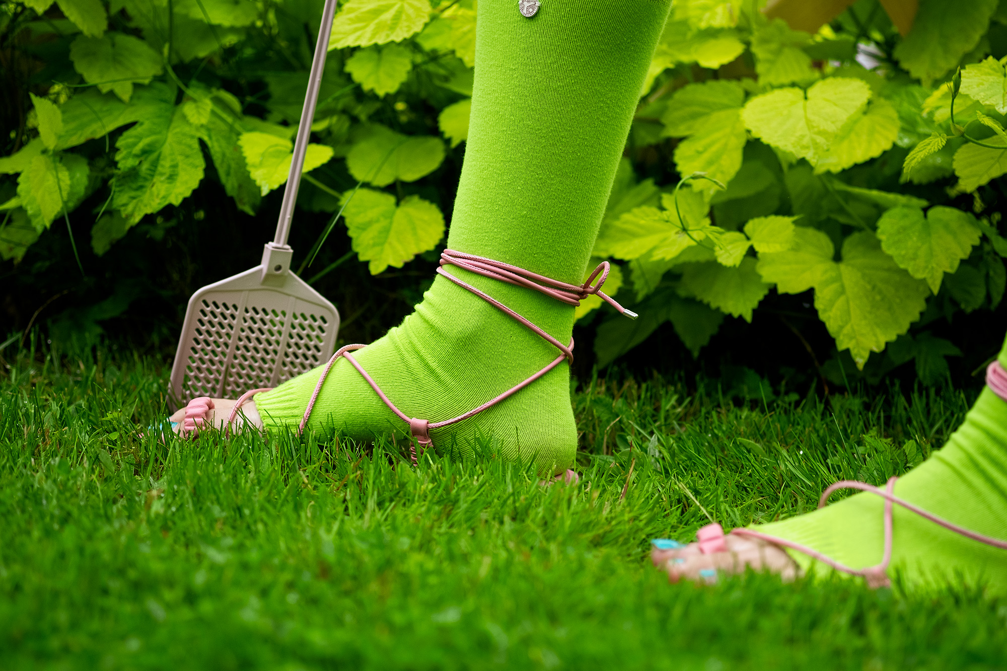Krull magazine, garden, lime green socks and pink sandals