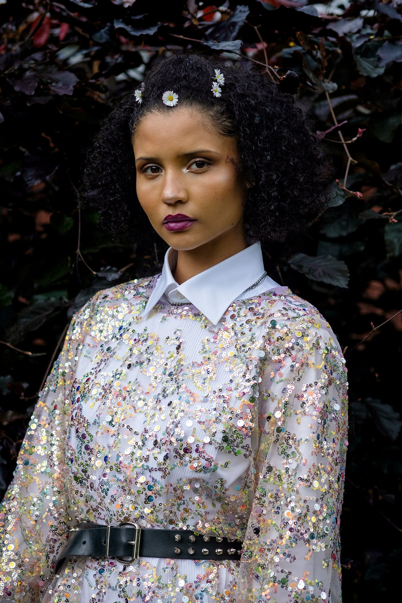 Krull magazine, Gardening Party, fashion story, model wearing sequin dress over tuxedo shirt with wildflowers in hair