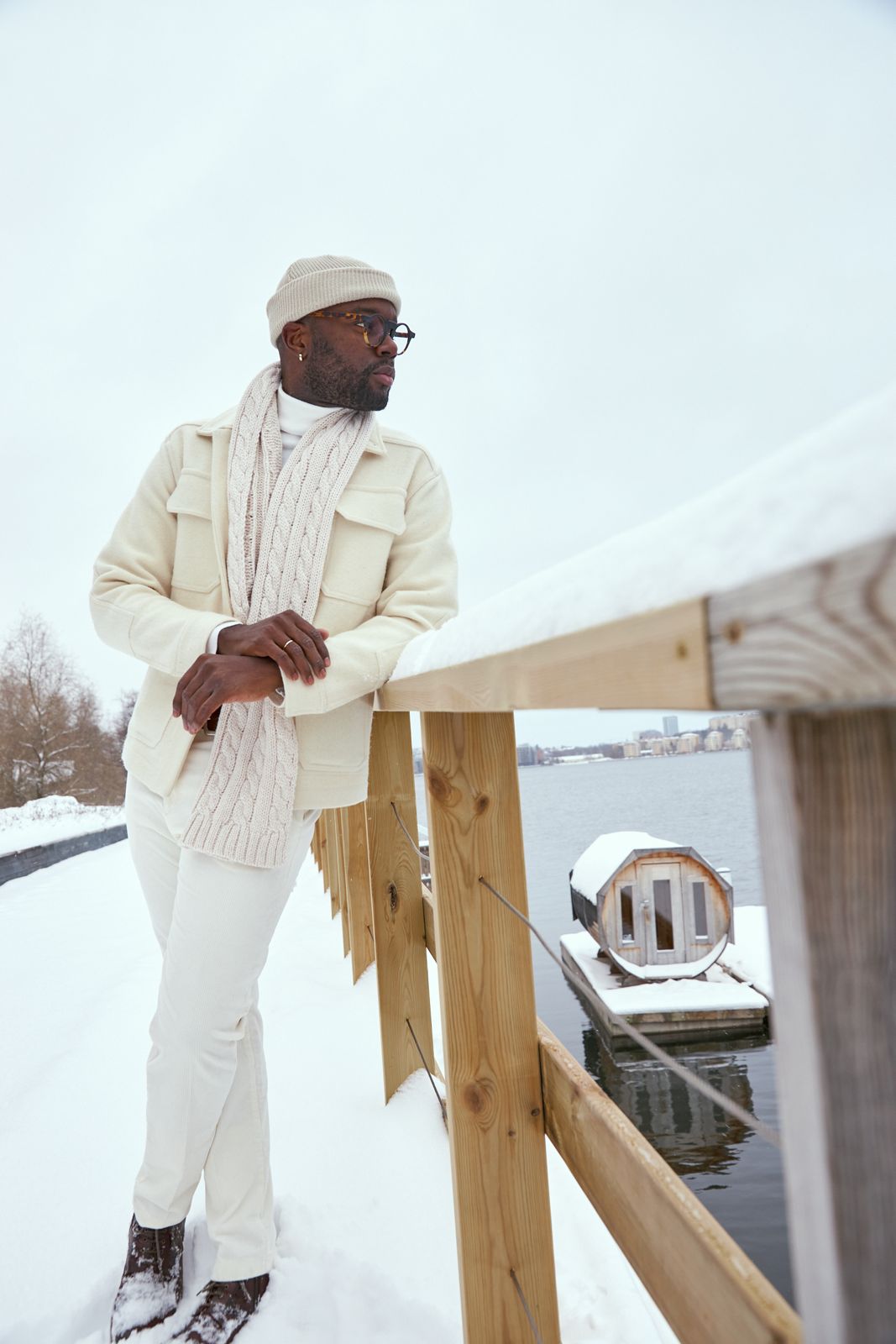 black male model in snow in winter white
