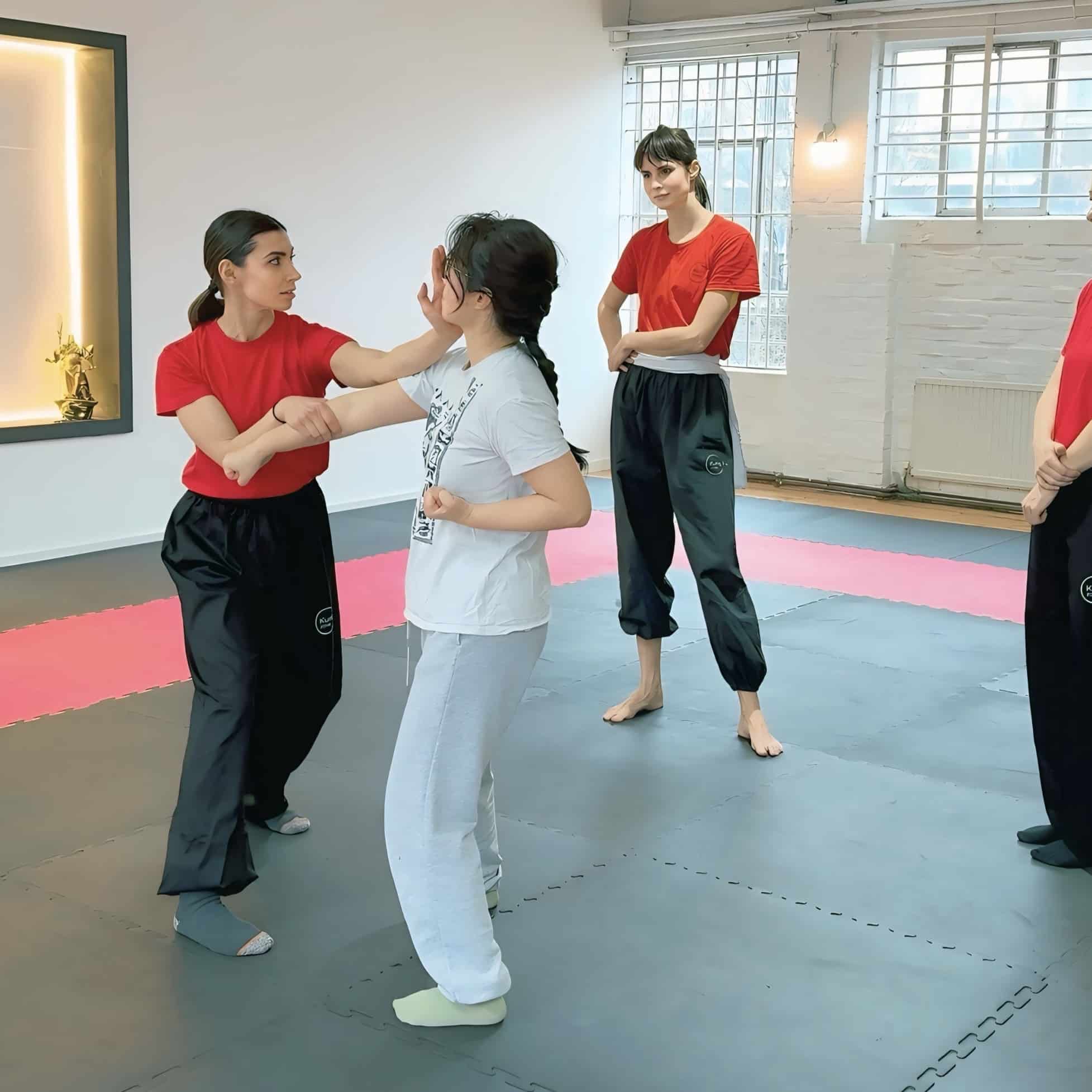 students sitting in kung fu class