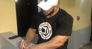 Bodybuilding champion Big Ramy signing LMP t-shirt