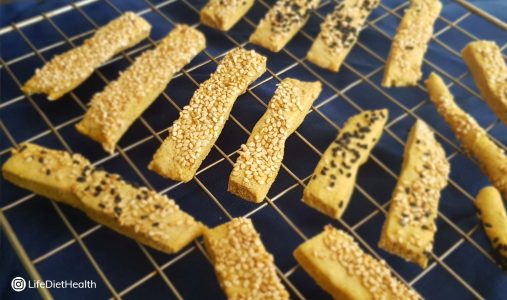 cheese straws on a wire rack