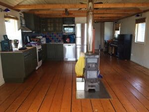 Kitchen, fireplace, piano